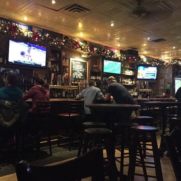 Photo taken at Quinn&#39;s Bar &amp; Grill by Priscilla P. on 11/26/2014