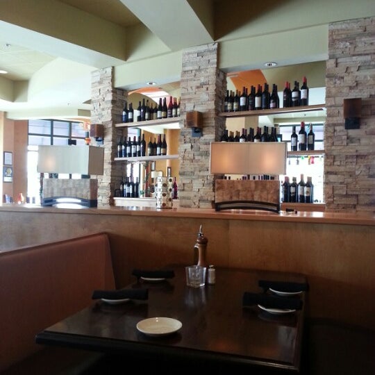 Photo taken at Travinia Italian Kitchen and Wine Bar by M. Todd B. on 10/26/2012