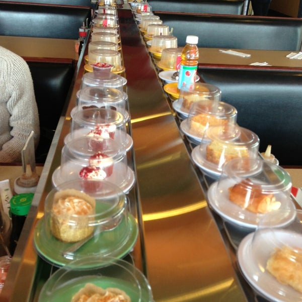 Photo taken at KiKu Revolving Sushi by Jay S. on 3/9/2013