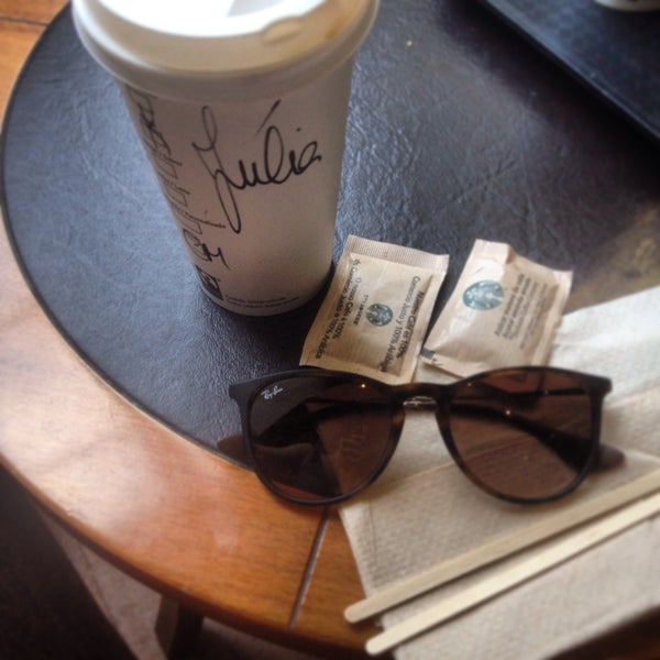 Photo taken at Starbucks by Julia T. on 6/10/2015
