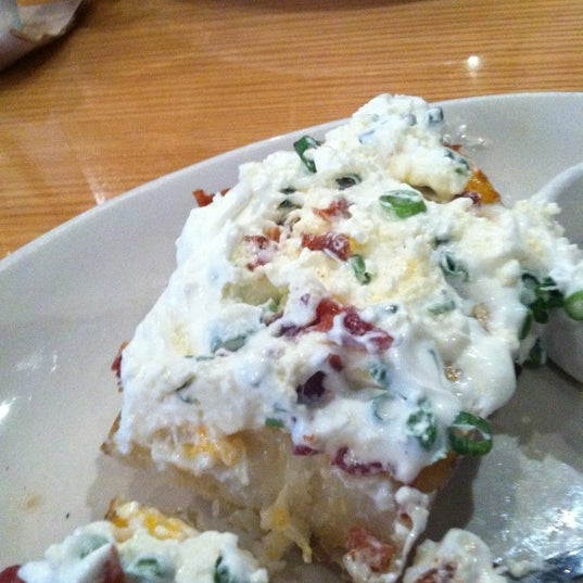 Photo taken at BJ&#39;s Restaurant &amp; Brewhouse by Lisa M. on 12/8/2012