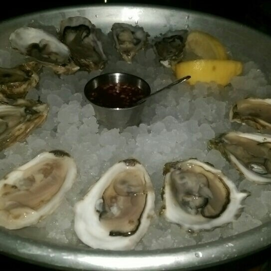 Photo taken at Muddy Waters Oyster Bar by Troy R. on 3/26/2016