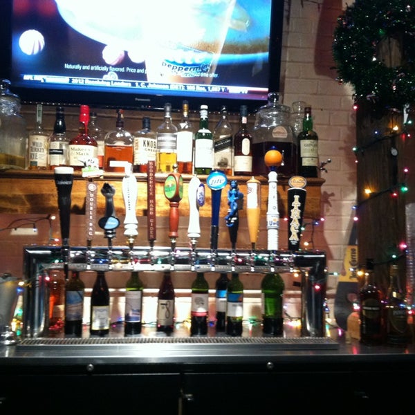 Photo taken at Box 63 American Bar &amp; Grill by Julie W. on 12/18/2012