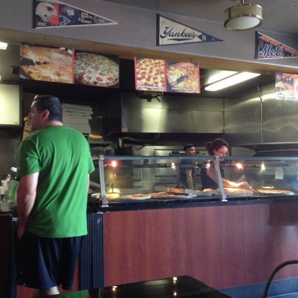 Photo taken at Joe&#39;s New York Pizza by Brant on 8/2/2014