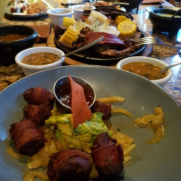 Photo taken at Tierra Santa Restaurante by Aidee V. on 5/11/2019