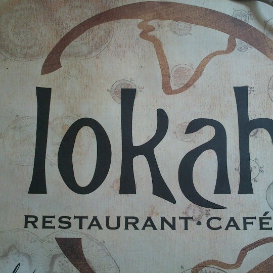 Photo taken at Lokah Restaurant and Café by Girish V. on 10/23/2012