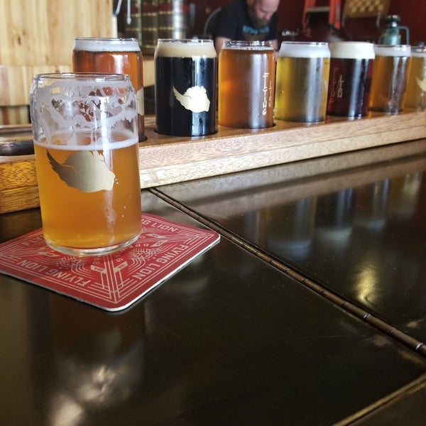 Photo taken at Flying Lion Brewing by Chris C. on 8/16/2019