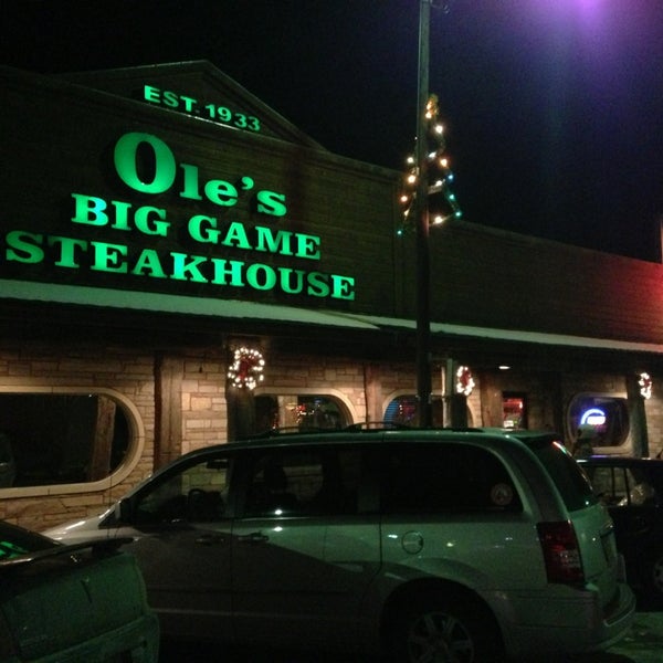 Photo taken at Ole&#39;s Big Game Steakhouse &amp; Lounge by Simon M. on 12/31/2012