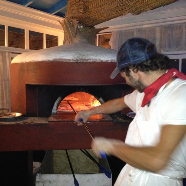Photo taken at Onlywood Pizzeria Trattoria by Dot e on 7/26/2013