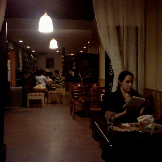 Photo taken at Cafe Romanat by Tad B. on 10/4/2012