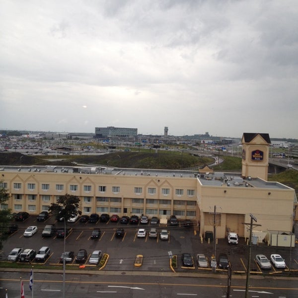 Photo taken at Fairfield Inn &amp; Suites by Marriott Montreal Airport by Shawn M. on 8/16/2014