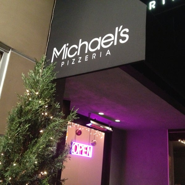 Photo taken at Michael&#39;s Pizzeria by Bryan E. on 12/24/2012