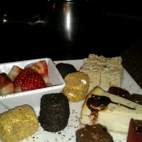 Photo taken at The Melting Pot by Kwame J. on 12/18/2012