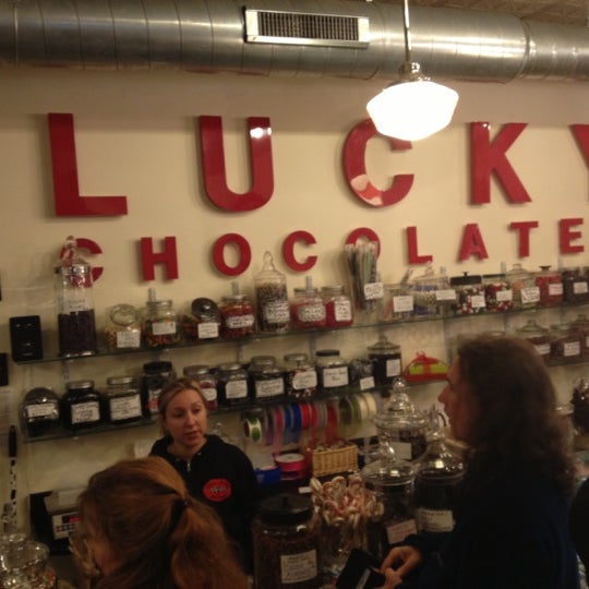 Photo taken at Lucky Chocolates, Artisan Sweets And Espresso by Kevin D. on 12/15/2012