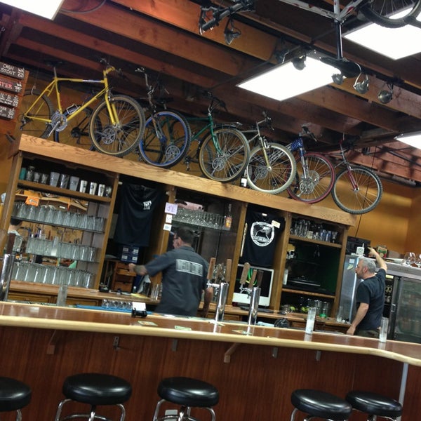 Photo taken at Velo Cult Bicycle Shop &amp; Bar by Dee S. on 10/5/2013