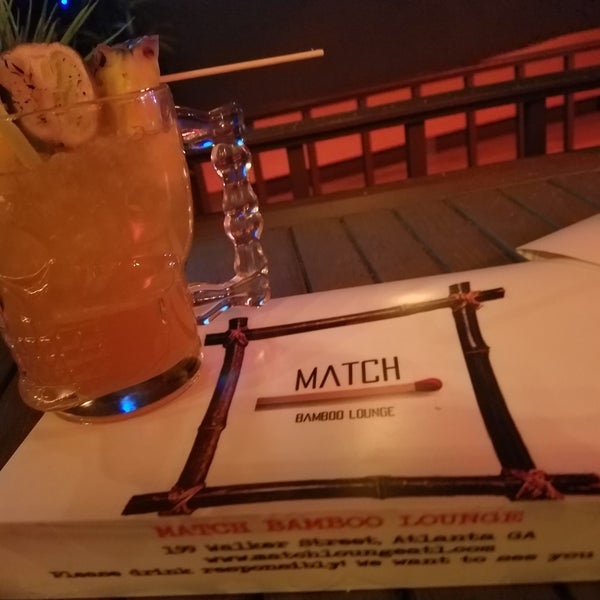The flaming Match Margarita and the jerk wings are amazing!
