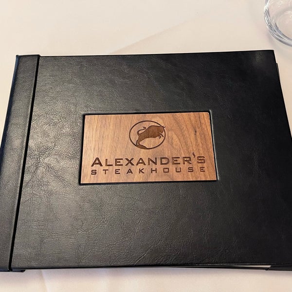 Photo taken at Alexander&#39;s Steakhouse by Ian C. on 7/20/2021
