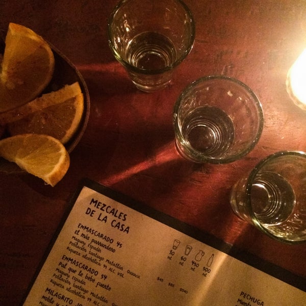 A hole-in-the-wall mezcal bar without signage. The menu is an intense booklet mapping out how and where every bottle is made.