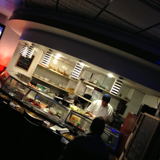 Photo taken at Planet Sushi by Charlie R. on 1/30/2013