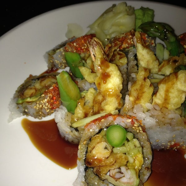 Foto diambil di East Moon Asian Bistro &amp; Sushi oleh Zoe A. pada 1/16/2013