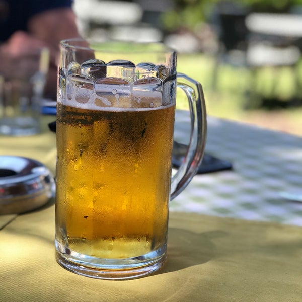 Photo taken at The Beer Garden by Burçin . on 6/8/2018