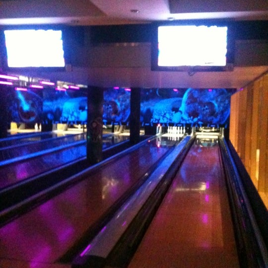 Photo taken at КосмоДоМ bowling &amp; bar by Eugenia C. on 11/16/2012