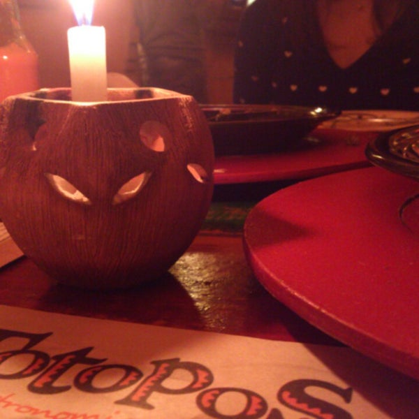 Photo taken at Totopos Gastronomia Mexicana by Mony G. on 6/12/2013