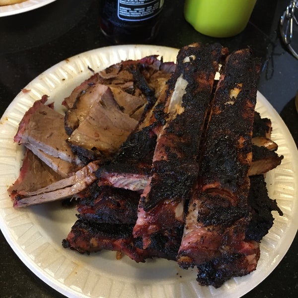 Photo taken at The Wood Pit Barbecue by Marc H. on 6/19/2018