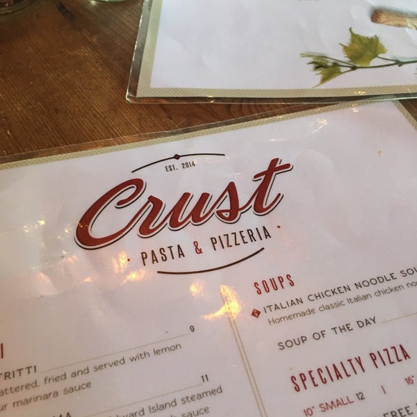Photo taken at Crust Pasta &amp; Pizzeria by Dave W. on 10/6/2016