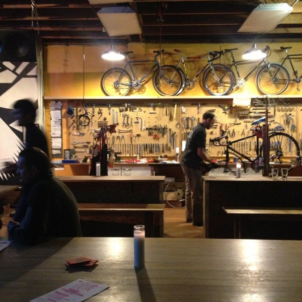 Photo taken at Velo Cult Bicycle Shop &amp; Bar by Sammi L. on 3/9/2013