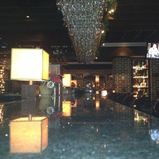 Photo taken at Bâton Rouge Grillhouse &amp; Bar by John P. on 12/5/2012