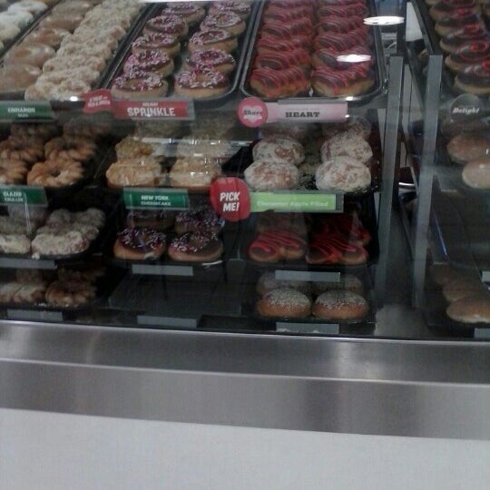 Photo taken at Krispy Kreme Doughnuts by Cathy P. on 1/31/2013