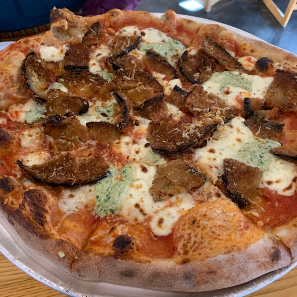 Photo taken at When Pigs Fly Wood-Fired Pizzeria by mike p. on 1/12/2020