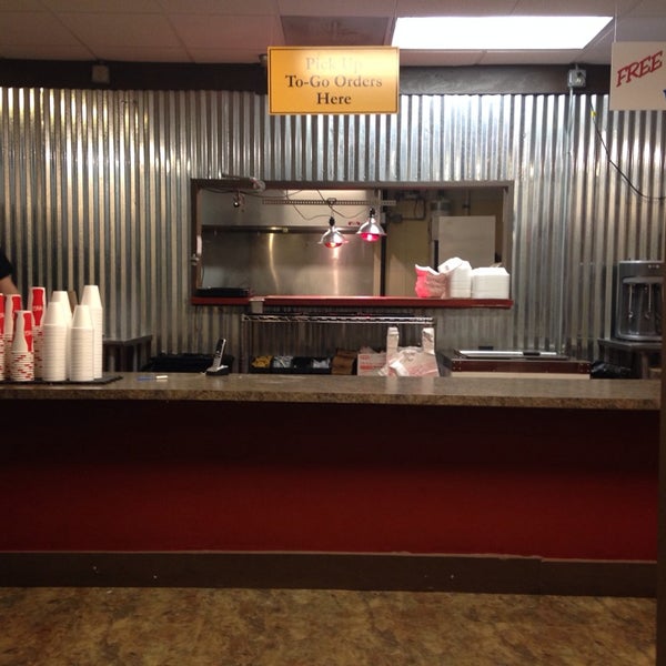 Photo taken at Moonie&#39;s Burger House by Slum V. on 12/25/2013