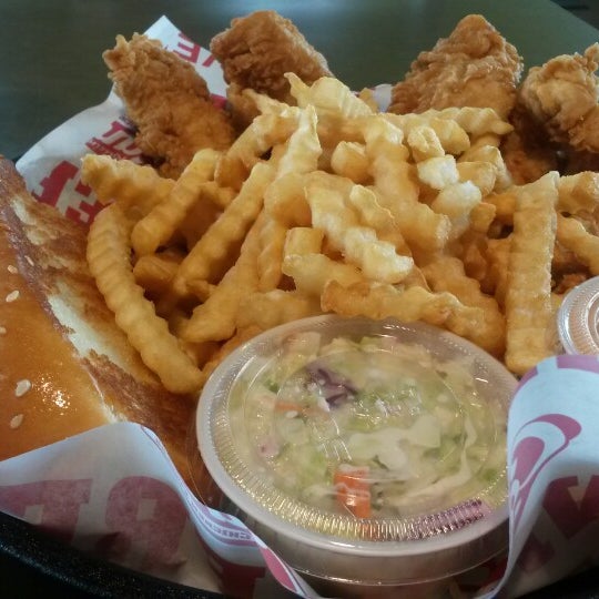 Photo taken at Raising Cane&#39;s Chicken Fingers by Lloyd S. on 5/5/2014