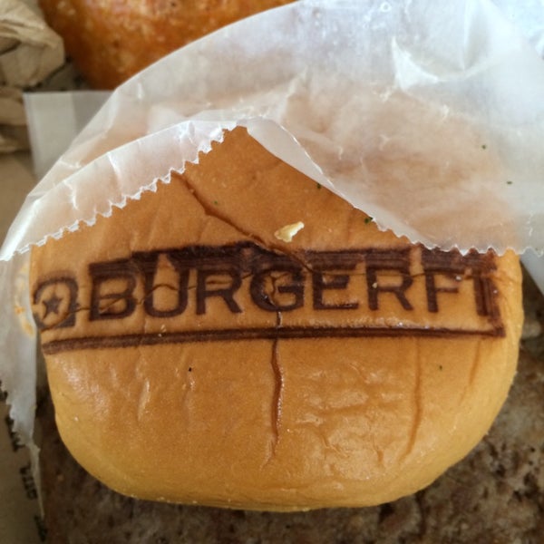 Photo taken at BurgerFi by Dustin J. on 10/17/2014