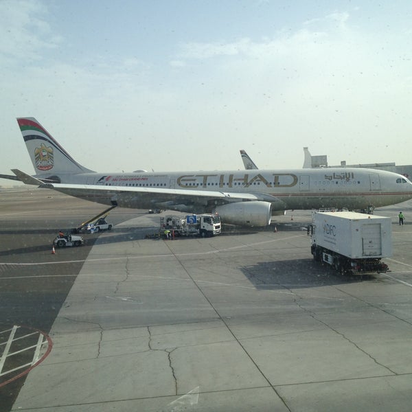Photo taken at Zayed International Airport (AUH) by Николай Б. on 4/19/2013