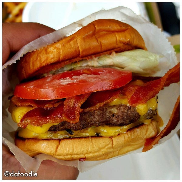 Photo taken at BurgerFi by Dafoodie on 8/4/2015