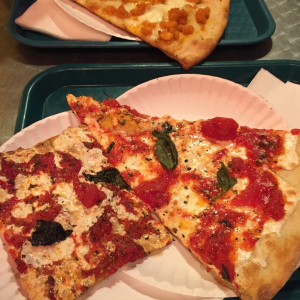 Margherita slice!! Standout. The rest of the slices are standard or ok, but this baby kills it. Aromatic, crispy, super fresh! (Gramma slice ok but too thick)