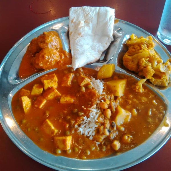 Photo taken at All India Sweets &amp; Restaurant by Ryan W. on 8/15/2015
