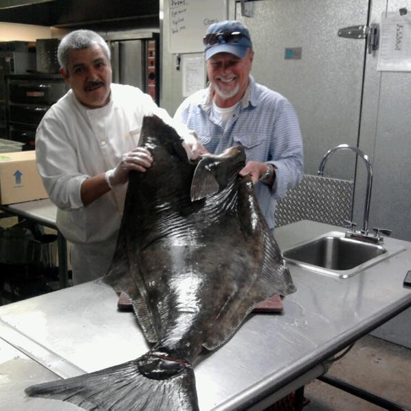 70 pounds of fresh Alaskan Halibut, ready to trim.  Chef Luis has some pretty sharp knives!