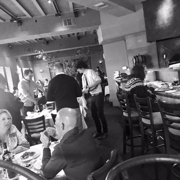 Photo taken at Oliveto Cafe &amp; Restaurant by Kyle M. on 5/20/2019