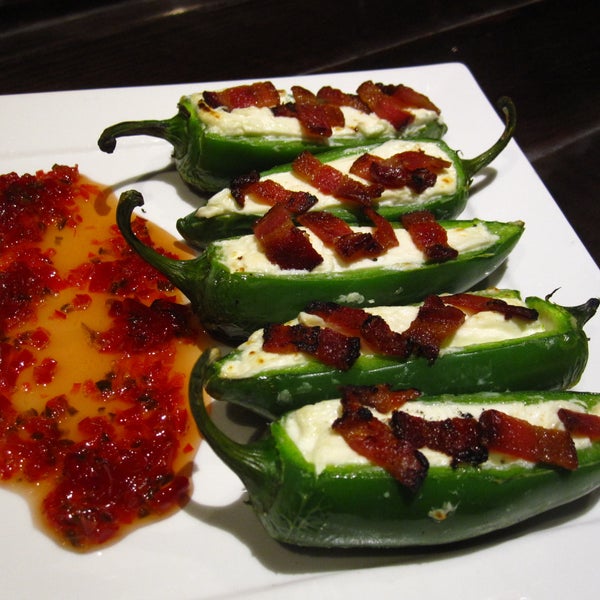Grilled Jalapeno "Poppers" with Mojave goat cheese, apple wood smoked bacon, and jalapeno jelly.