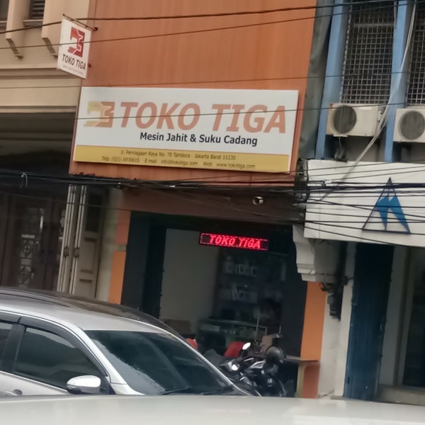 Toko Tiga Mesin Jahit Tailor Shop