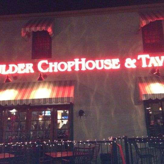 Photo taken at Boulder Chophouse &amp; Tavern by Krystal S. on 12/9/2012