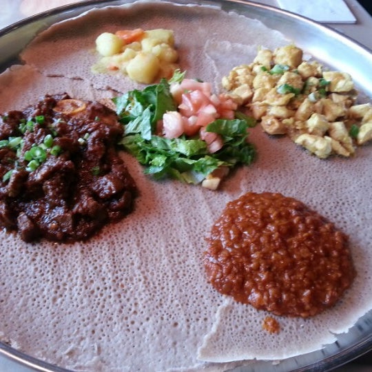Photo taken at Ethiopian Diamond Restaurant &amp; Bar by Cheryl W. on 12/31/2012