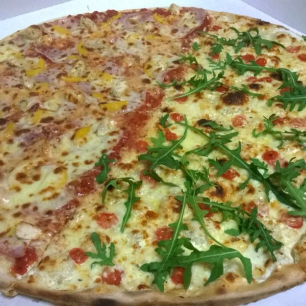 Very nice and delicious 60cm pizza. Quattro formaggi originale / Pesca