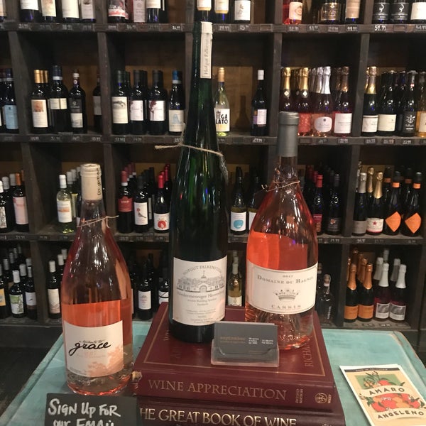 Photo taken at September Wines &amp; Spirits by Alicia M. on 8/11/2018