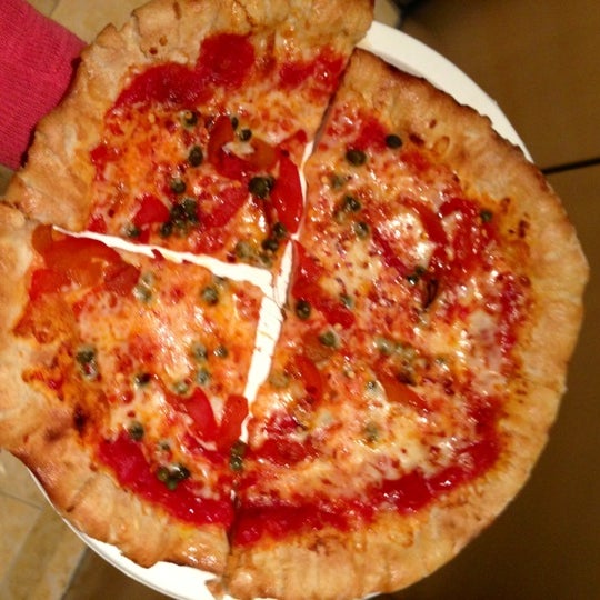 Foto tomada en Firetrail Pizza  por Sahitya K. el 10/26/2012