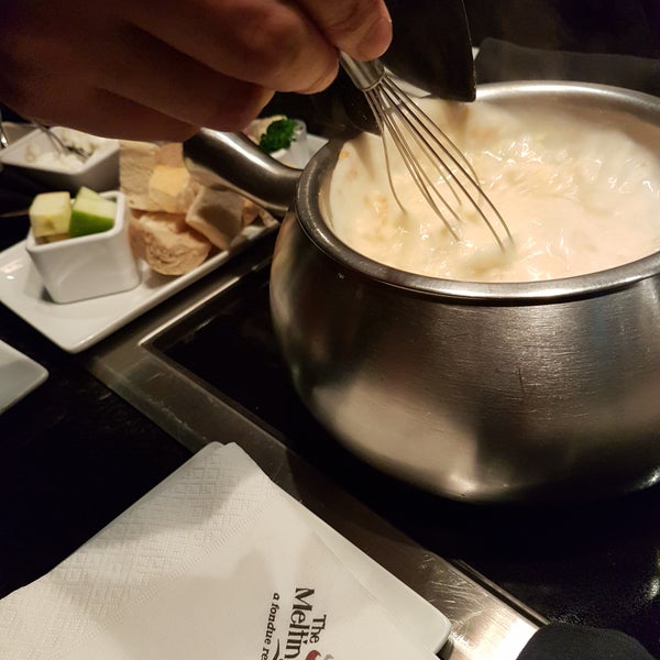 Photo taken at The Melting Pot by Baba H. on 3/17/2017